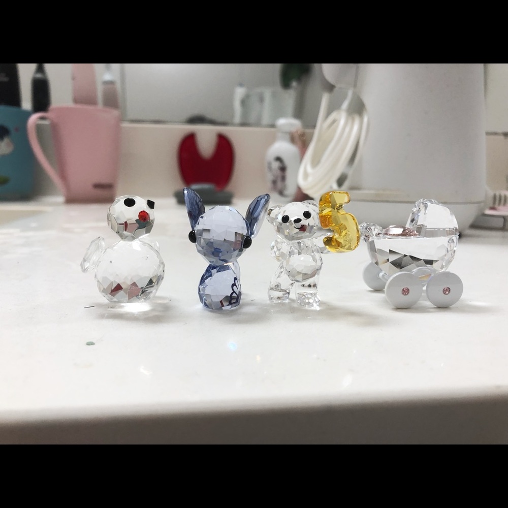 Four Swarovski figures